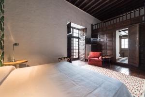 Säng eller sängar i ett rum på Casa Espiritu Santo