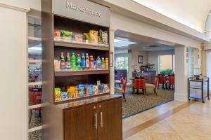 a lobby with a pharmacyacistacistacistacistacist at Comfort Suites Gastonia - Charlotte in Gastonia +35 photos