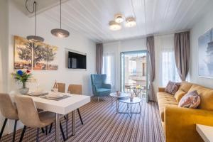 a living room with a couch and a table at 45House in Nafplio