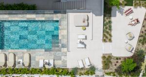 an overhead view of a swimming pool at a resort at FOS Luxury Suites in Nikiti