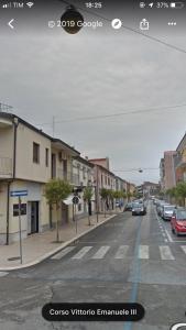 an image of a city street with cars parked at Venere Rooms in Termoli
