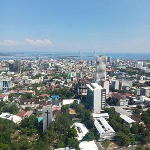 an aerial view of a city with tall buildings at Horizon101 in Cebu City