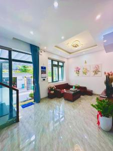 a living room with a couch and a table at weolhouse in Hue
