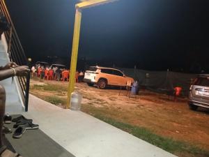 a group of people standing in front of a group of vehicles at Loki guest House in Chikmagalūr +3 photos