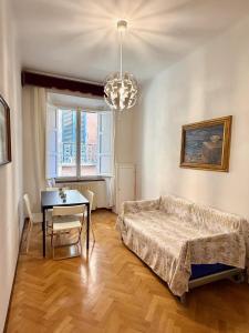 a living room with a couch and a table at La Dolce Vita in Pisa