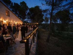 a bride and groom walking down the aisle at a wedding at Beautiful mountain chalet in Siete Aguas