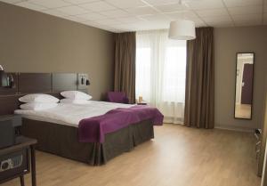 Postel nebo postele na pokoji v ubytování Best Western Plus Park Airport Hotel