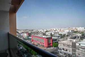 a view of a city from a balcony at فندق بيات سيتي in Taif