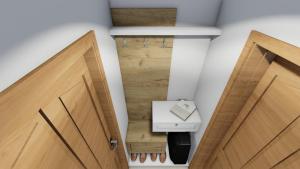 a room with two wooden doors and a sink at Pansion Vila Vrsar in Vrsar