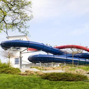 a blue and red water slide in a park at Panoramablick 85 m2 5 persoons in Lennestadt