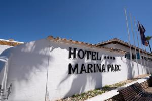 a sign for a hotel marina park at BLUESEA Marina Parc in Na Macaret
