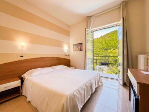 Llit o llits en una habitació de Hotel Ca' De Berna 48 fotos més