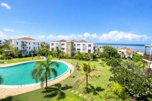 an aerial view of a resort with a pool and palm trees at Sultan palace Luxury Two bedrooms in Kilifi