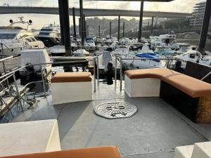 a marina with many boats in a harbor at SLEEPBOAT Golden Life Yacth Oporto in Douro in Porto