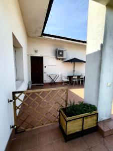 a view of a patio with a table and chairs at Vivi Conero in Ancona +55 photos