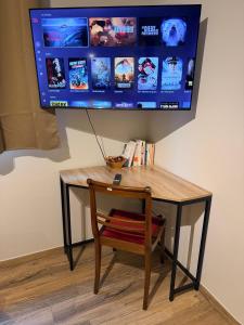 Televisor o centre d'entreteniment de La Uffheimoise - La Rustique 3 fotos més