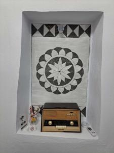 a white box with a radio in it at Patasa holiday apartment in Pyrgi