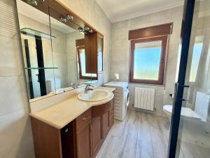 a bathroom with a sink and a toilet at El Trocador - 12805 in Ajo