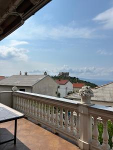 a balcony with a view of the ocean at Apartment Bepo in Senj