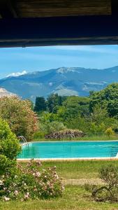 a swimming pool with a view of a mountain at Casa Pratolungo in Velletri