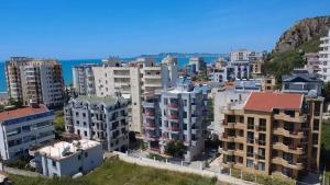 an aerial view of a city with buildings at Rigandi in Durrës