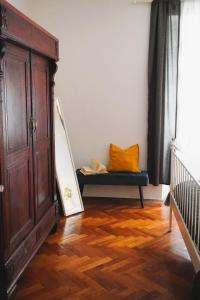 a room with a couch and a bed in a room at TT Apartmani - Historic Center Pula in Pula +20 photos