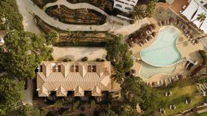 an aerial view of a resort with a swimming pool at Vale d'El Rei Hotel & Villas in Carvoeiro
