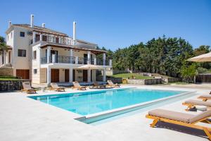 an image of a villa with a swimming pool at Utopia Beach Villa in (( Litherés ))