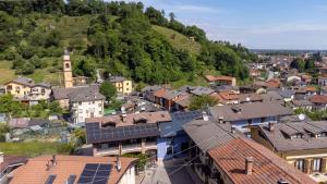 an overhead view of a town with solar roofs at La Collina delle Rondini in Boves