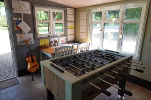 a kitchen with a stove top oven in a room at "Exclusive" Glen Farm Glamping in Cromer