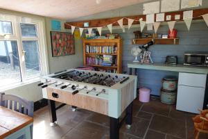 a kitchen with a stove top in a room at "Exclusive" Glen Farm Glamping in Cromer