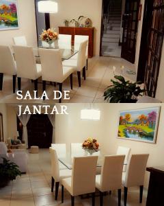 a dining room with a table and white chairs at Casa Cris e Edinho in Garanhuns