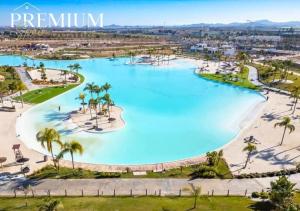 an aerial view of the pool at the resort at LUXURY VILLA ALMENDRO 15 WITH PRIVATE HEATED POOL at SANTA ROSALIA RESORT by PREMIUM SPAIN PROPERTIES in Torre-Pacheco