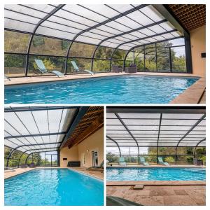 a swimming pool with a glass ceiling and a swimming pool at Gîte Les Chaumes in Orsennes