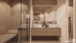 a bathroom with two sinks and a shower at Augusta Apartments in Fliess