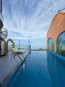 a swimming pool on the roof of a house at Lamay Villa Tam Đảo in Tam Ðảo