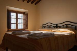 Letto o letti in una camera di Frantoio di Corsanico