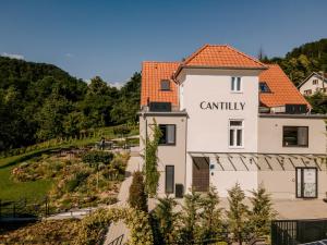 a building with the words cannality on it at Cantilly Garden in Samobor