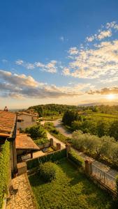 arial view of a house with a view of a river at We Love Umbria in Collazzone