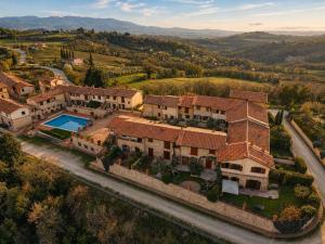 an aerial view of a house with a swimming pool at We Love Umbria in Collazzone