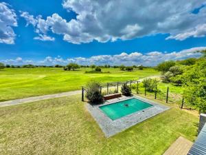 an overhead view of a backyard with a swimming pool at Greens & Dreams in Parys