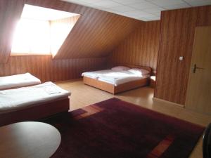 Postel nebo postele na pokoji v ubytování Pomorska Zajazd Restauracja
