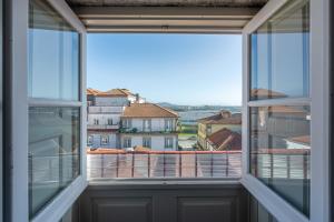 a view from the window of a building at Rua Grande Hotel in Viana do Castelo
