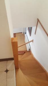 an overhead view of a staircase with wooden floors at Moradia Vinhais in Vinhais
