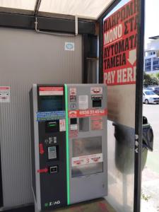 an atm machine in front of a gas station at Pension Castello in Rethymno