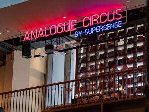 a sign for an antcedes credit circuits by superstore at 25hours Hotel Dubai One Central in Dubai