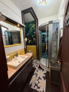 a bathroom with a sink and a shower at Villa Éden in Siófok +84 photos