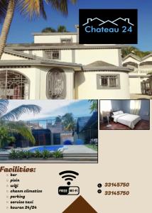 a picture of a house with a palm tree at C24 guesthouse in Cap-Haïtien