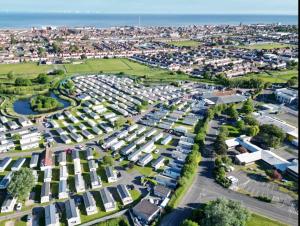 an aerial view of a suburb with houses at J&A Caravan in Rhyl