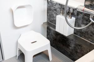 a bathroom with a white toilet and a sink at 2F, 3F - Vacation STAY 20122v in Sumiyoshi +23 photos